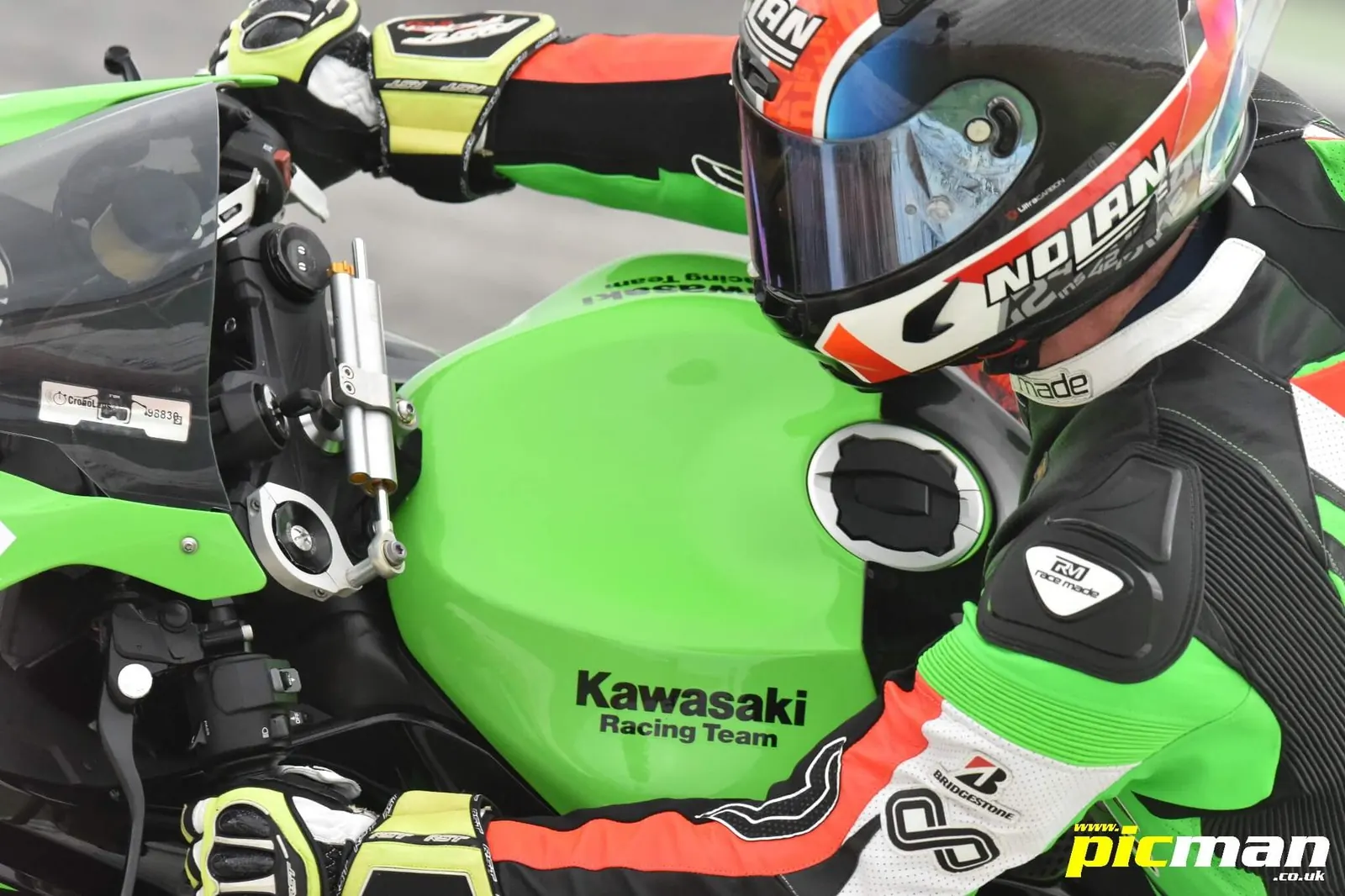 Rider in RaceMade leathers on a Kawasaki